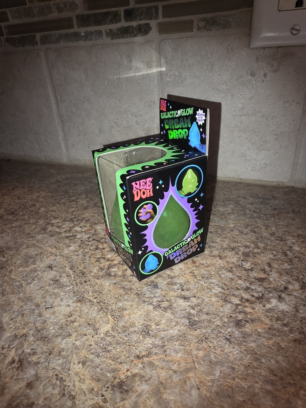 NeeDoh Galactic Glow Dream Drop Squishy Glow in the Dark Fidget Toy Cosmic Bloom - Picture 3 of 5